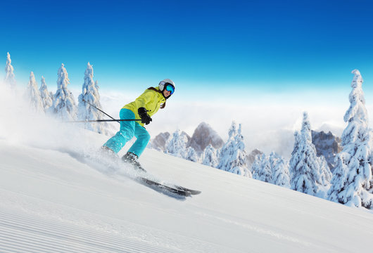 Young woman skiing in Alps