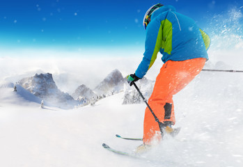 Young man skiing in Alps