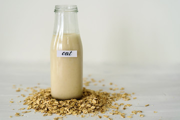 Glass bottle of oat milk