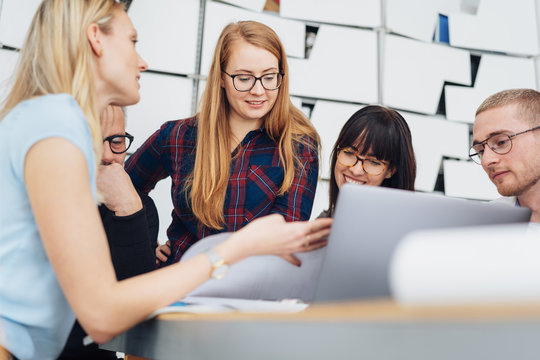 Group of dedicated young people in a meeting