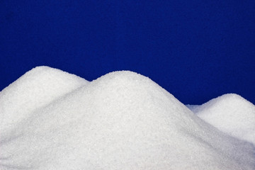 white sugar mountains, blue background