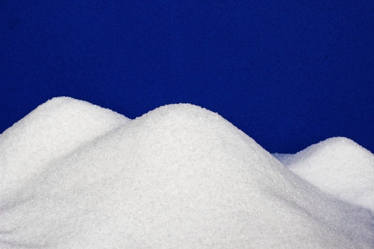 white sugar mountains, blue background