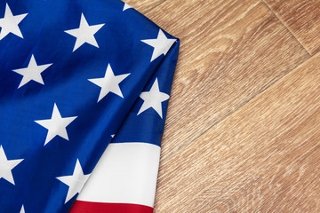 flag of the United States of America on wooden background. USA holiday of Veterans, Memorial, Independence and Labor Day.