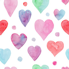 Tender seamless watercolor pattern with red, blue, pink and green hearts and dots. Lovely hand painted background for Valentine's day wallpaper, textile, wrapping paper, cards design