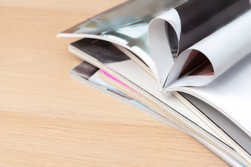 Pages of book curved into a heart shape, close up