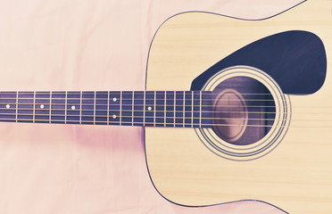 Fototapeta premium Acoustic guitar top view / Close up of guitar musical instrument tone vintage style classic