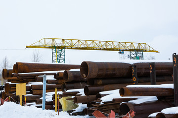 Metal rolling. A round tube large diameter are stacked in storage for sale and loading in stock in...
