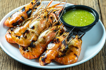 Grilled shrimps on a white plate