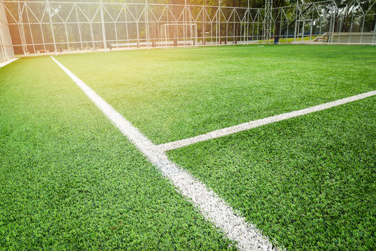 Football field - Futsal field green grass field sport outdoor white line center and goal nets background