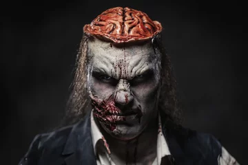 Fotobehang Scary zombie prostheric makeup on male model © Nejron Photo