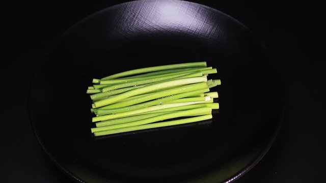 stem of garlic rotating