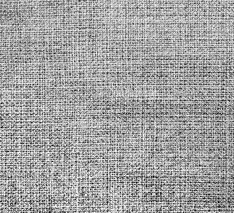 Fototapeta na wymiar The background of textured gray natural fabric .
