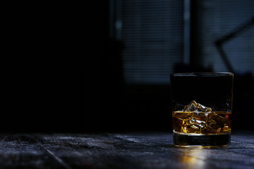 whiskey with ice in modern glasses