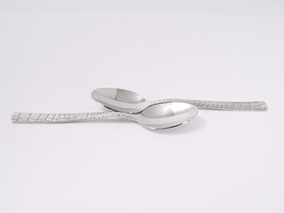 silverware forks spoons knives cutlery on a white background