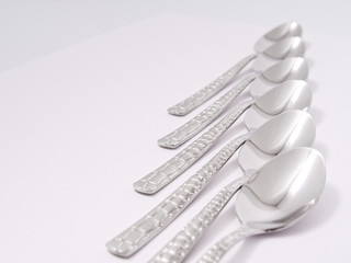 silverware forks spoons knives cutlery on a white background