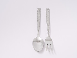 silverware forks spoons knives cutlery on a white background