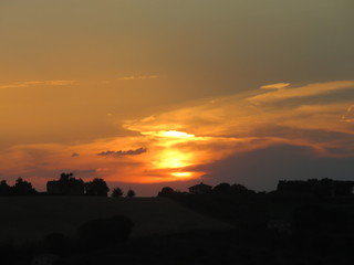 Obraz premium Tramonto nuvoloso