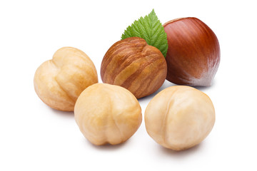 Hazelnuts with leaves, isolated on white background