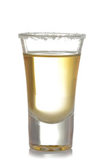 gold tequila in a glass glass with salt close up on an isolated white background