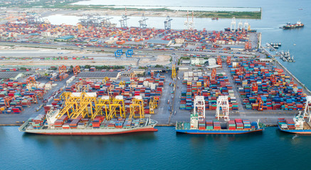 Container ship leaving the port,aerial view.