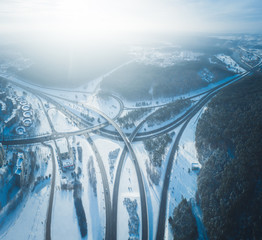 Frozen winter highway junction intersection, aerial panorama