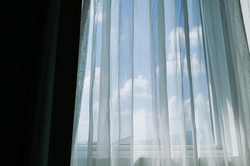 Fototapeta na wymiar white curtain on window