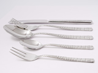 silverware forks spoons knives cutlery on a white background