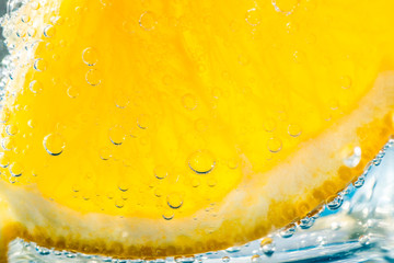 Ripe orange, water and air bubbles