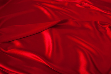 Fototapeta na wymiar Smooth elegant red silk can use as background