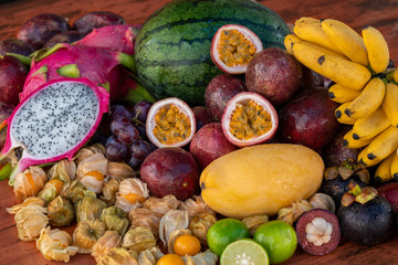 Heaps of exotic fruits close up