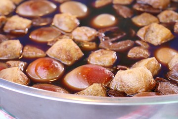 Eggs and pork in brown sauce