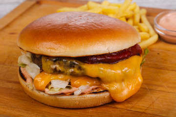 Burger with beef, cheese and iceberg salad