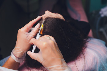 Platelet rich plasma injection procedure. Hair growth stimulation. PRP therapy process.