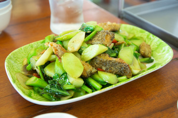 Stir-fried kale with sun-dried crispy fish