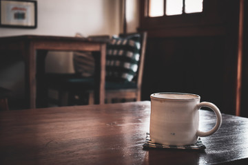 coffee cup on wooden table