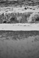 Fototapeta na wymiar Stormy Beach Wave Rock Formations