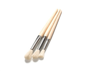 Paint tools, set of three brushes together on a white background