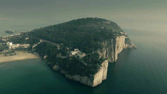 Aerial view of the Montagna Spaccata or Broken Mountain, a sharply vertical cliff, in Gaeta, Italy