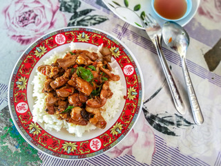 Spicy fried chicken innards with basil leaves Recommended dishes in the country Thailand.