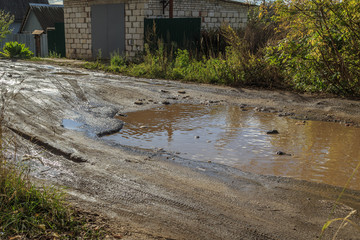 roadway in a provincial Russian city in poor condition