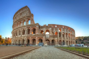Obraz na płótnie Canvas The Colosseum in Rome at sunrise, Italy