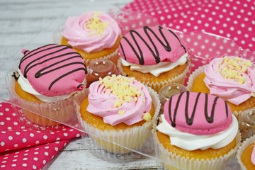 Delicious cakes on wooden background.Sweet dessert for coffee.
