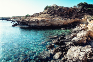 Sea caves near Cape Greko. Mediterranean Sea
