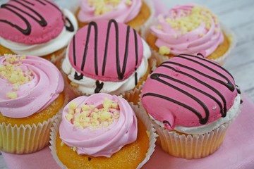 Delicious cakes on wooden background.Sweet dessert for coffee.