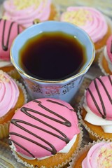 Delicious cakes on wooden background.Sweet dessert for coffee.