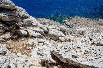 Sea caves near Cape Greko. Mediterranean Sea