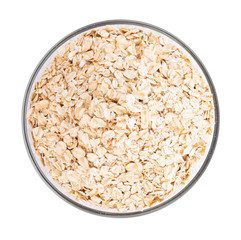Oat flakes pile in bowl on white background