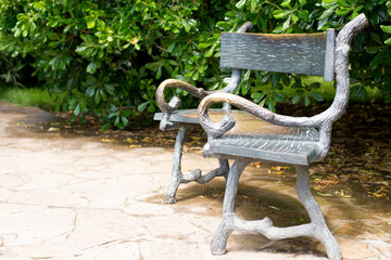 beautiful park bench on a summer day