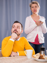 Mature mother and son quarrel