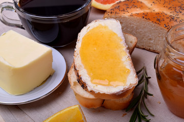 Slice of bread with butter and jam. Breakfast food